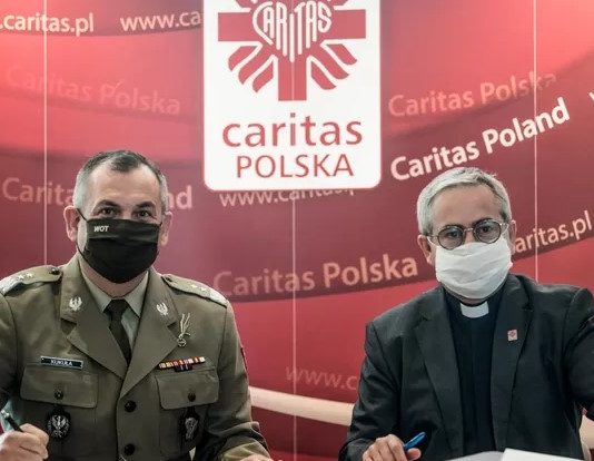 Wojska Obrony Terytorialnej bedą pracować ramię w ramię z Caritas Polska
